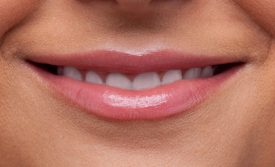 Naklejka premium Beauty woman lips smile close-up