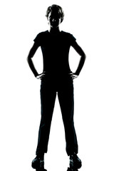 Fototapeta premium one young teenager boy or girl silhouette standing hands on hips