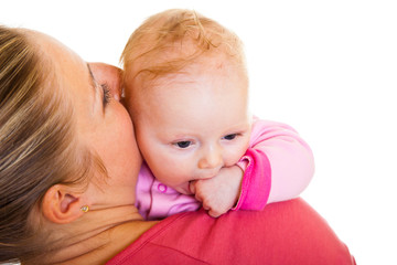 Mother holding infant baby girl isolated on white