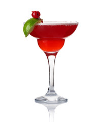 Glass of alcohol cocktail with lime and cherry isolated