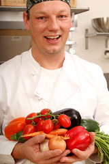 Koch mit Gemüse