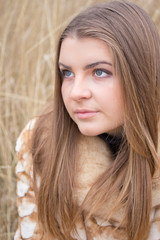 Girl in an autumn field