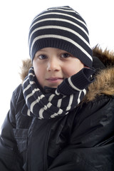 portrait of boy wrapped in winterclothes