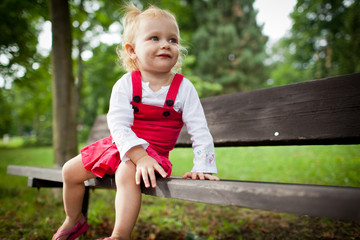 cute little girl outdoors in a park