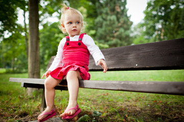 cute little girl outdoors in a park