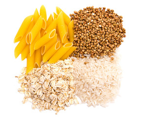 Macaroni, rice, buckwheat and oatmeal isolated on white © DimplyDimity