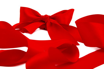 Red christmas ribbon isolated on white