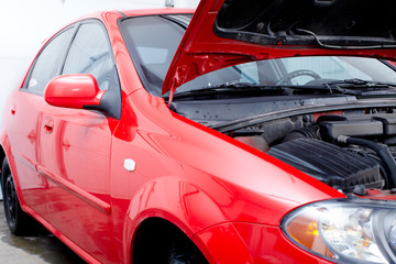 Car in auto repair shop.