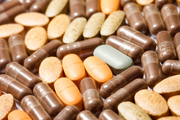 Medicinal pills piled up a bunch