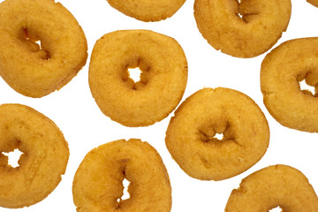 Small doughnuts on white background