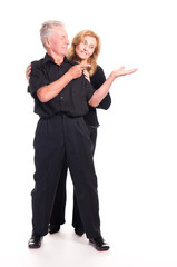 elderly couple posing