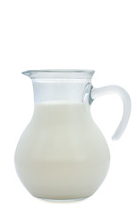 small jug of milk  over white background