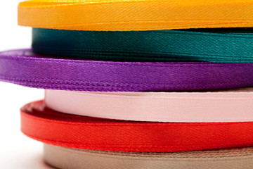 Reels of ribbon isolated on the white background