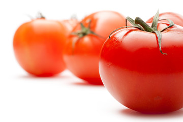 Tomatoes isolated on white background