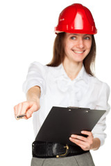 Smiling young woman in red hard hat