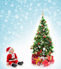Cheerful boy in Santa Claus hat
