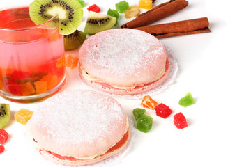 Two cakes and cocktail isolated on white