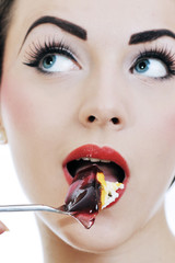beautiful young woman eat sweet cake