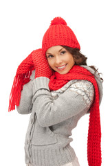 beautiful woman in hat, muffler and mittens