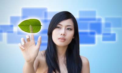 Portrait of Asian girl press recycle button.