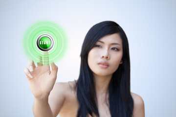 Portrait of Asian girl press recycle button.