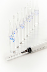 Medical syringe and an ampoules with medication