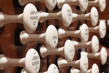 Pipe organ stop knobs close up
