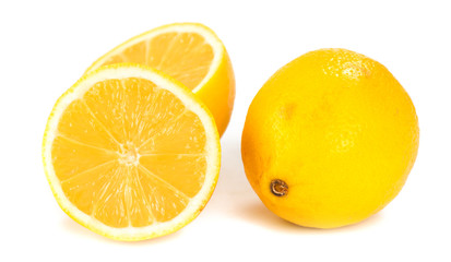 Closeup of half lemon and wellness one on white background