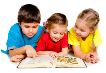 small kids with a book