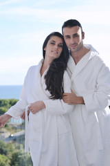 couple relaxing on balcony