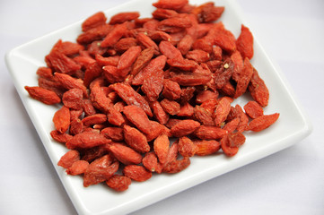 close up of wolfberry with white as background