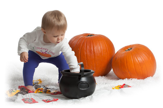 Girl with Pumpkins and Candy