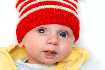 baby with red winter hat