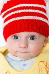 baby with red winter hat