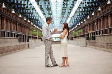 Handsome Man Talking To Beautiful Woman