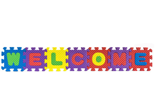 The word "Welcome" with puzzle letters isolated