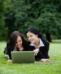 Female Executives Using Laptop