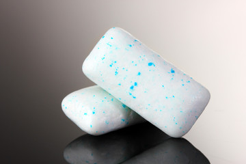 Chewing gums on gray background