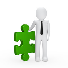 business man hold a puzzle green