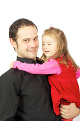 Portrait of happy father and his adorable little daughter