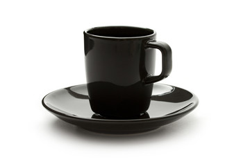 A black set of coffee cup and saucer