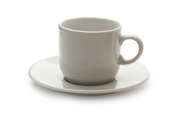A white set of cup and saucer