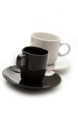 A set of coffee cups and saucers