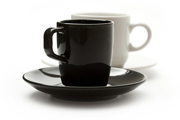 A set of coffee cups and saucers