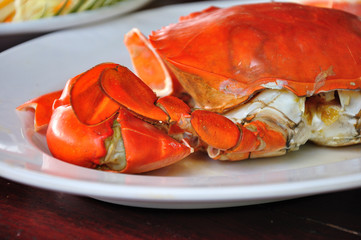 Undressed roasted crabs prepared on plate