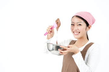 attractive asian woman cooking