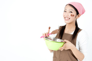 attractive asian woman cooking