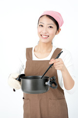 attractive asian woman cooking
