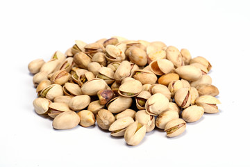 Toasted pistachios on a white background