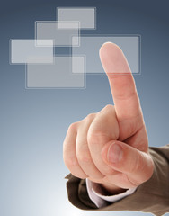 The hand pressing one of the transparent buttons